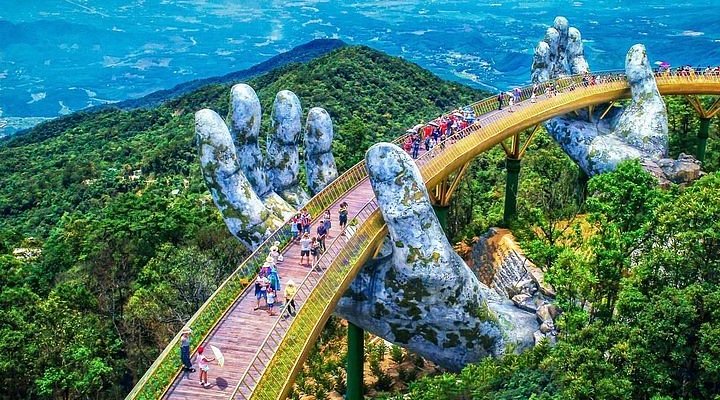 Tourist walking over a bridge